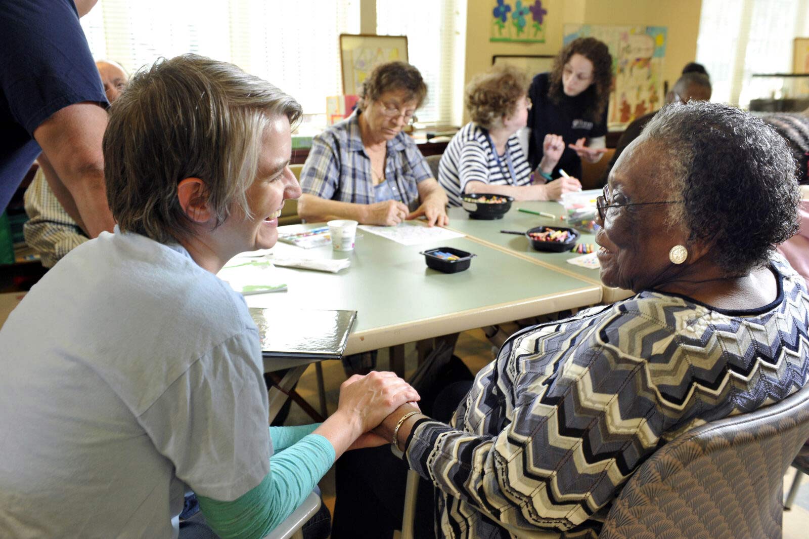 PAC student with an older adult