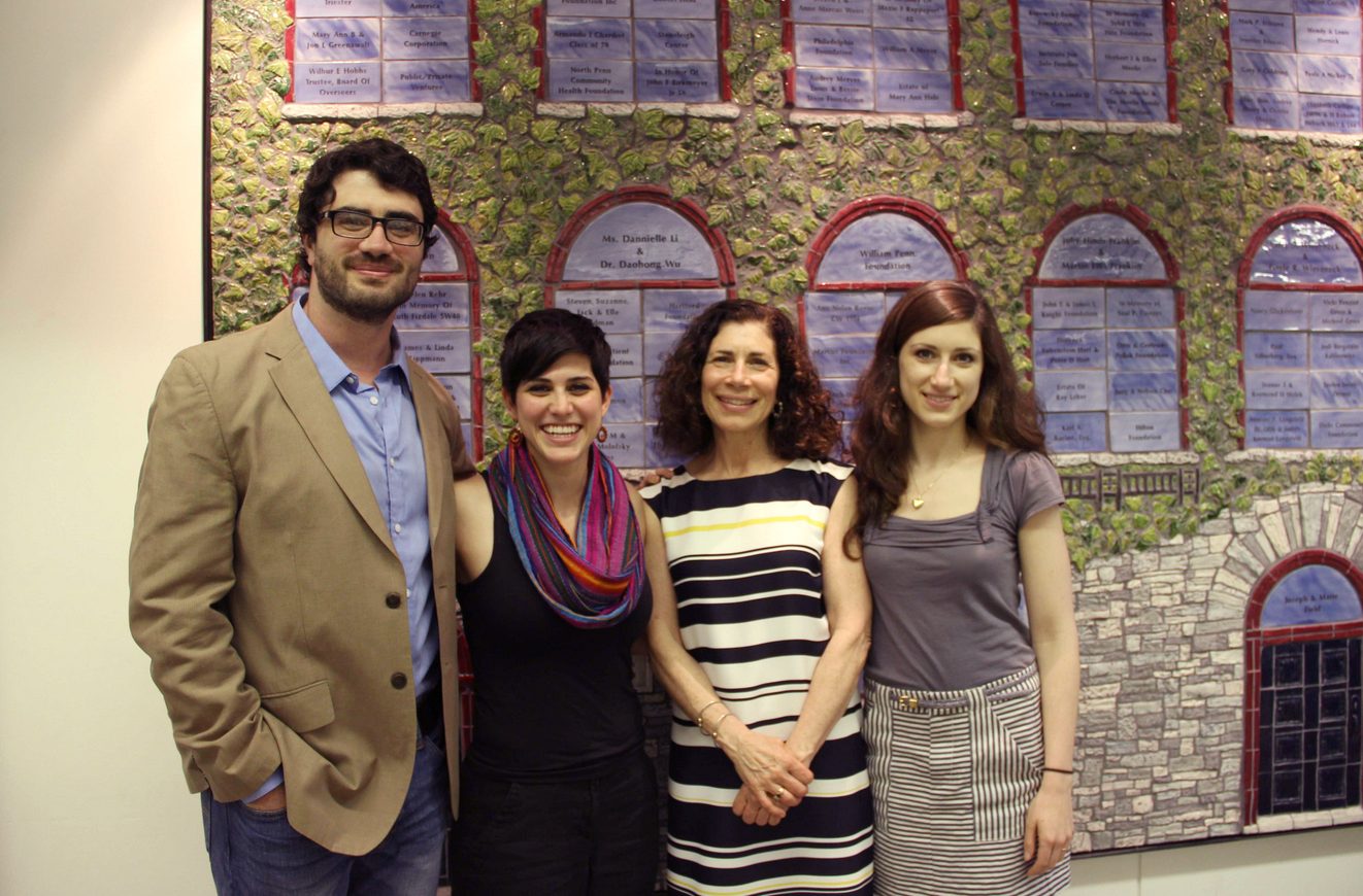 Carolina Fojo and others pose in the Caster lobby