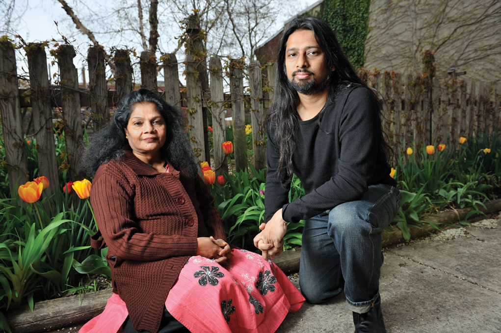 Dr. Toorjo Ghose with woman sitting