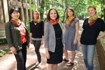 Martha Heuser, NPL’13; Holly Cronin; Dr. Femida Handy, Jennifer Gillard, NPL’14; and Laura Repcheck, MSW’13 each wear a piece of the same sari to remember their experience.