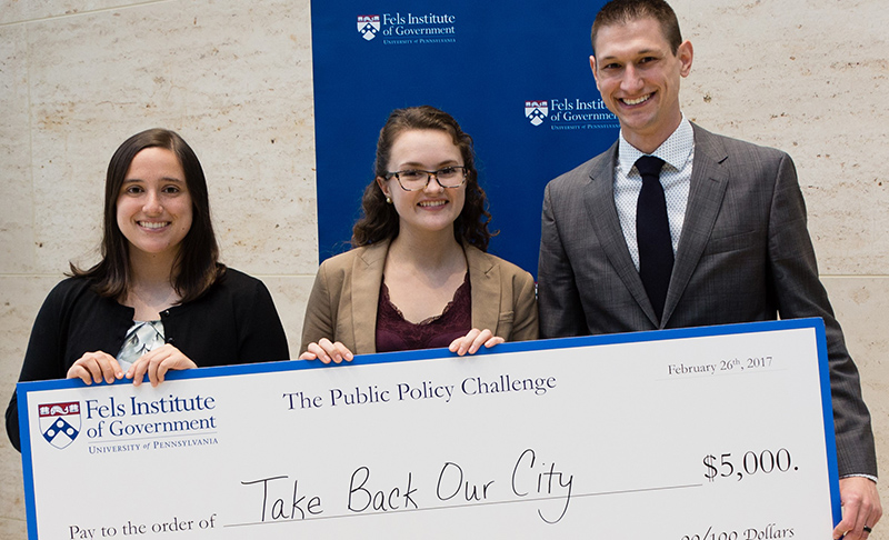 Team Take Back Our City at Penn Public Policy Challenge poses with $5,000 check