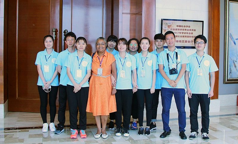 Dr. Jerri Bourjolly poses with students