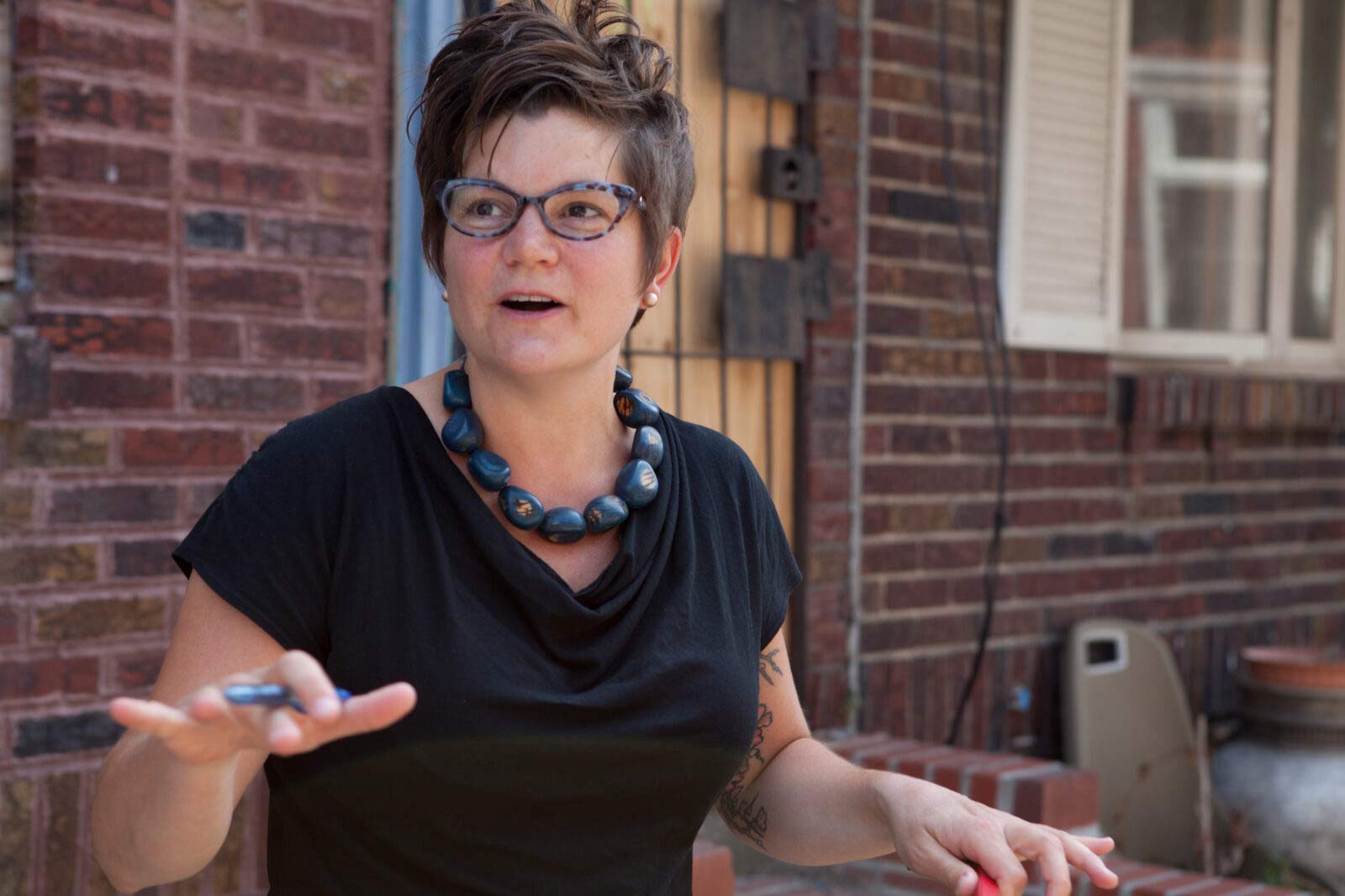 Image of Amy Castro Baker walking in South Philadelphia