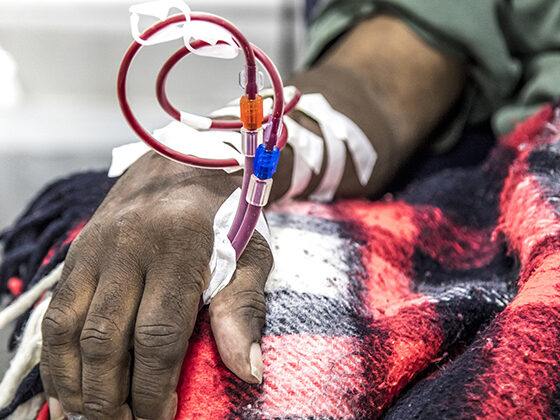 Hand with blood being drawn