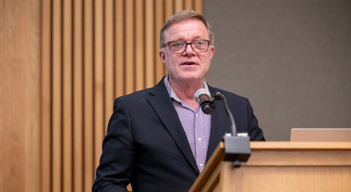 Dennis Culhane speaks at a podium