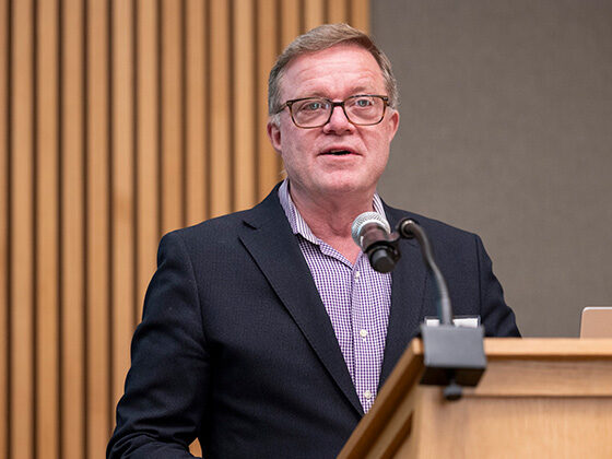 Dennis Culhane speaks at a podium