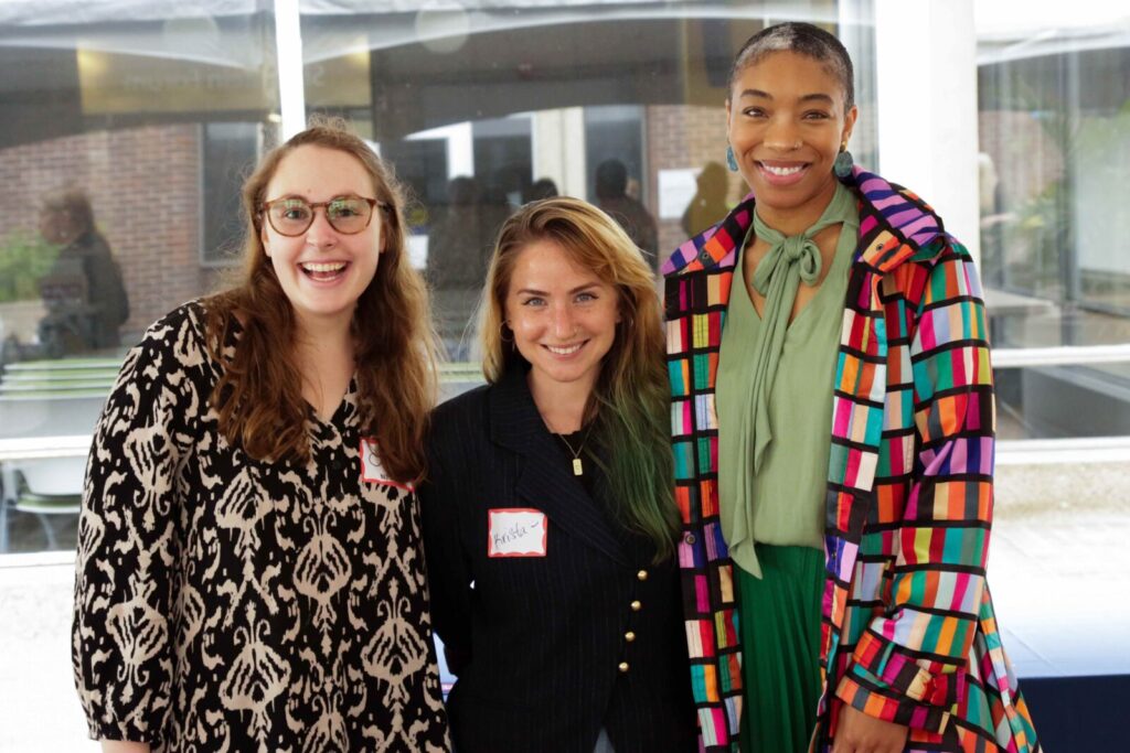 Three people pose for a photo at SP2's Celebrating Partnerships and Student Impact event