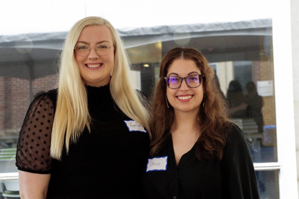 Two people take a picture together at SP2's Celebrating Partnerships and Student Impact event