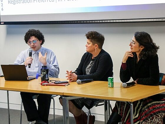 Panelists speak at Politics Of Well Being Economics event